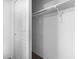 A closet with a hanging bar and white walls at 935 E Agua Fria Ln, Avondale, AZ 85323