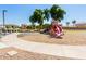 Community park playground with a slide, swing, and sandbox at 935 E Agua Fria Ln, Avondale, AZ 85323
