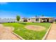 Wide backyard featuring a well-manicured lawn and privacy fence, creating an outdoor retreat at 1001 W 19Th St, Tempe, AZ 85281