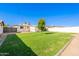 Lush backyard features mature landscaping and a well maintained lawn at 1001 W 19Th St, Tempe, AZ 85281