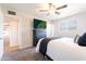 Cozy bedroom featuring a ceiling fan, and a large window at 1001 W 19Th St, Tempe, AZ 85281