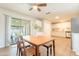 Bright dining area with sliding glass doors and a view of the kitchen at 1001 W 19Th St, Tempe, AZ 85281