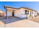 Exterior view of home highlighting the convenient covered parking and neat landscaping at 1001 W 19Th St, Tempe, AZ 85281