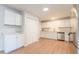Well-lit kitchen with modern appliances, lots of storage, and sleek countertops, perfect for cooking at 1001 W 19Th St, Tempe, AZ 85281