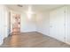 Spacious living room boasts wood-look floors, neutral paint and ample natural light at 1001 W 19Th St, Tempe, AZ 85281