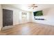 Inviting living room with a large window, wood floors, and sleek wall-mounted entertainment unit at 1001 W 19Th St, Tempe, AZ 85281