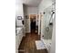 Ensuite bathroom featuring a glass-enclosed shower and granite countertops at 10704 E Twister Ave, Mesa, AZ 85212
