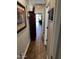Inviting hallway with tile floors leads to sunlit living areas at 10704 E Twister Ave, Mesa, AZ 85212