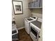 Laundry room with modern washer and dryer units for efficient laundry care at 10704 E Twister Ave, Mesa, AZ 85212