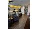 Open living space with a kitchen island and modern cabinetry at 10704 E Twister Ave, Mesa, AZ 85212