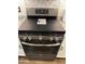 Stainless steel electric range with smooth top, oven and digital display at 10704 E Twister Ave, Mesa, AZ 85212