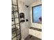 This secondary bathroom features modern finishes and a built-in shower niche at 11028 W Crimson Ln, Avondale, AZ 85392
