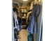 Organized walk-in closet with shelves, hanging racks, and ample storage space at 11028 W Crimson Ln, Avondale, AZ 85392