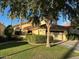 Charming single-Gathering home with a well-manicured lawn and mature landscaping at 11028 W Crimson Ln, Avondale, AZ 85392