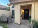Inviting front patio featuring stucco siding and a welcoming entrance at 11028 W Crimson Ln, Avondale, AZ 85392