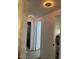 Hallway with access to rooms, featuring recessed lighting and light wood-look flooring at 11028 W Crimson Ln, Avondale, AZ 85392