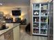 A modern, open concept kitchen with stainless steel appliances, granite countertops, and abundant storage space at 11028 W Crimson Ln, Avondale, AZ 85392