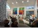 Open living room with soaring ceilings, modern decor, and plenty of natural light at 11028 W Crimson Ln, Avondale, AZ 85392