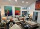 Bright living room with high ceilings, abundant natural light, and stylish decor at 11028 W Crimson Ln, Avondale, AZ 85392