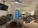 Well-appointed primary bedroom featuring high ceilings, ample natural light, and tasteful decor at 11028 W Crimson Ln, Avondale, AZ 85392