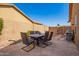 Spacious outdoor dining space with comfortable seating and well-maintained patio at 11242 E Onza Ave, Mesa, AZ 85212