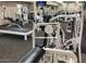 Fully-equipped fitness center with a variety of exercise machines and weights for a complete workout at 11242 E Onza Ave, Mesa, AZ 85212