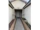 The home's entrance has a concrete walkway leading to a charming front door at 12501 W Rosewood Dr, El Mirage, AZ 85335