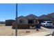 Charming single-Gathering home with desert landscaping, a two-car garage, and neutral color palette at 12501 W Rosewood Dr, El Mirage, AZ 85335