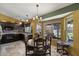 Cozy breakfast nook with large windows overlooking the backyard and modern appliances at 13593 N 91St Way, Scottsdale, AZ 85260
