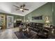 Cozy living room featuring a fireplace, comfortable seating, and neutral decor at 13593 N 91St Way, Scottsdale, AZ 85260