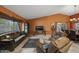 Inviting living room features tile flooring, high ceilings, and rustic decor at 13593 N 91St Way, Scottsdale, AZ 85260
