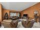 Bright living room with tile floors, comfortable seating, and plenty of natural light at 13593 N 91St Way, Scottsdale, AZ 85260