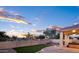 Inviting backyard offers a covered patio, low-maintenance landscaping, and plenty of space for recreation at 1398 W Windhaven Ave, Gilbert, AZ 85233