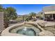 Inviting outdoor hot tub area with scenic mountain views and patio at 14007 E Lupine Ave, Scottsdale, AZ 85259
