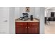 Coffee bar features dark wood cabinetry and granite countertops with convenient outlets at 15456 W Corrine Dr, Surprise, AZ 85379