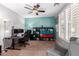 Bright office with a large window, comfortable seating, and functional workspace at 15456 W Corrine Dr, Surprise, AZ 85379