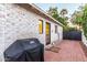 Exterior view of home with brick paving, Weber grill, and outdoor access at 1625 N 11Th Ave, Phoenix, AZ 85007