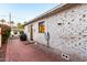 Home exterior featuring brick paving and an electric vehicle charging station at 1625 N 11Th Ave, Phoenix, AZ 85007