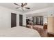 Spacious bedroom featuring hardwood floors, a ceiling fan, and a sitting area at 1625 N 11Th Ave, Phoenix, AZ 85007