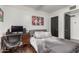 Bright bedroom with natural light, desk and hardwood floors at 1625 N 11Th Ave, Phoenix, AZ 85007
