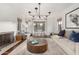 Stylish living room featuring a fireplace, chic lighting, and comfortable seating with a coffee table at 1625 N 11Th Ave, Phoenix, AZ 85007