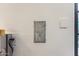 White painted wall features a vintage-style hatch and a Ring alarm system at 1625 N 11Th Ave, Phoenix, AZ 85007