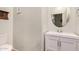 Powder room features a white vanity with cabinet, a modern sink and faucet, and a toilet at 16386 W Sierra St, Surprise, AZ 85388