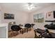 Exercise room showcasing large window, workout equipment, and plenty of open space at 16386 W Sierra St, Surprise, AZ 85388