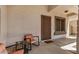 Cozy front porch with comfortable seating perfect for enjoying quiet moments outdoors at 16386 W Sierra St, Surprise, AZ 85388