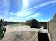 Large backyard with a shed, pavers, trees, and grass at 16617 W Desert Mirage Dr, Surprise, AZ 85388
