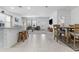 Open-concept living area featuring lots of natural light and modern decor at 16617 W Desert Mirage Dr, Surprise, AZ 85388