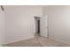 Bright bedroom with a door leading to another room at 16813 S 30Th Ave, Phoenix, AZ 85045