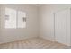 Bedroom featuring a window and closet at 16813 S 30Th Ave, Phoenix, AZ 85045
