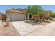 Single-Gathering home featuring desert landscaping and a two-car garage with an extended driveway at 16813 S 30Th Ave, Phoenix, AZ 85045